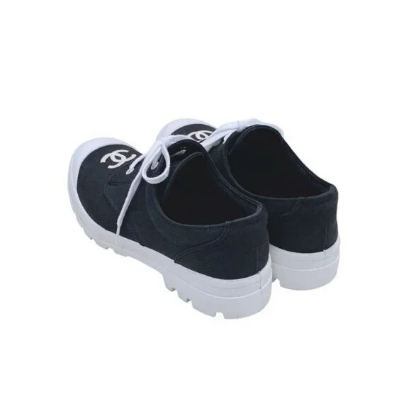 Authentic CHANEL CC Sneakers Black and White Coco Mark Bicolor